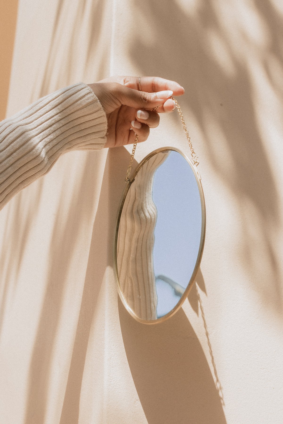 Person Holding a Mirror 